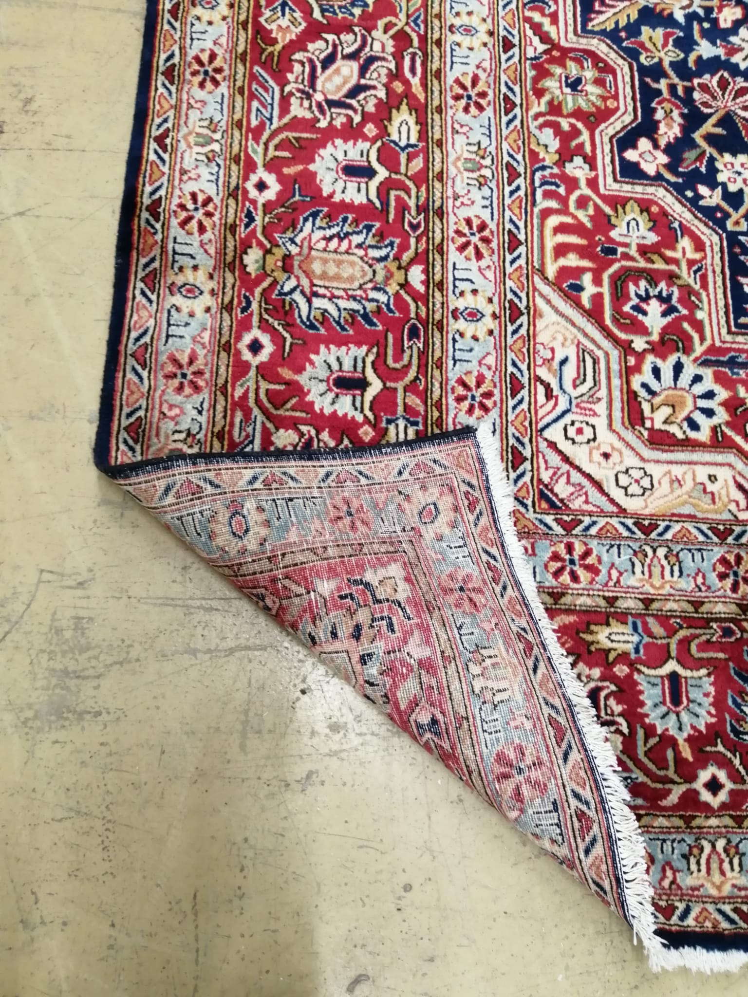 A Kashan blue ground carpet, 360 x 250cm